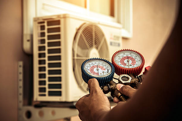 Professional Ac Installation technician working in Middle Village, NY